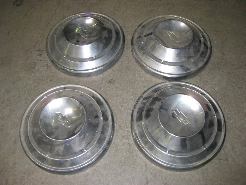 1969 Camaro stock hub caps for sale nice