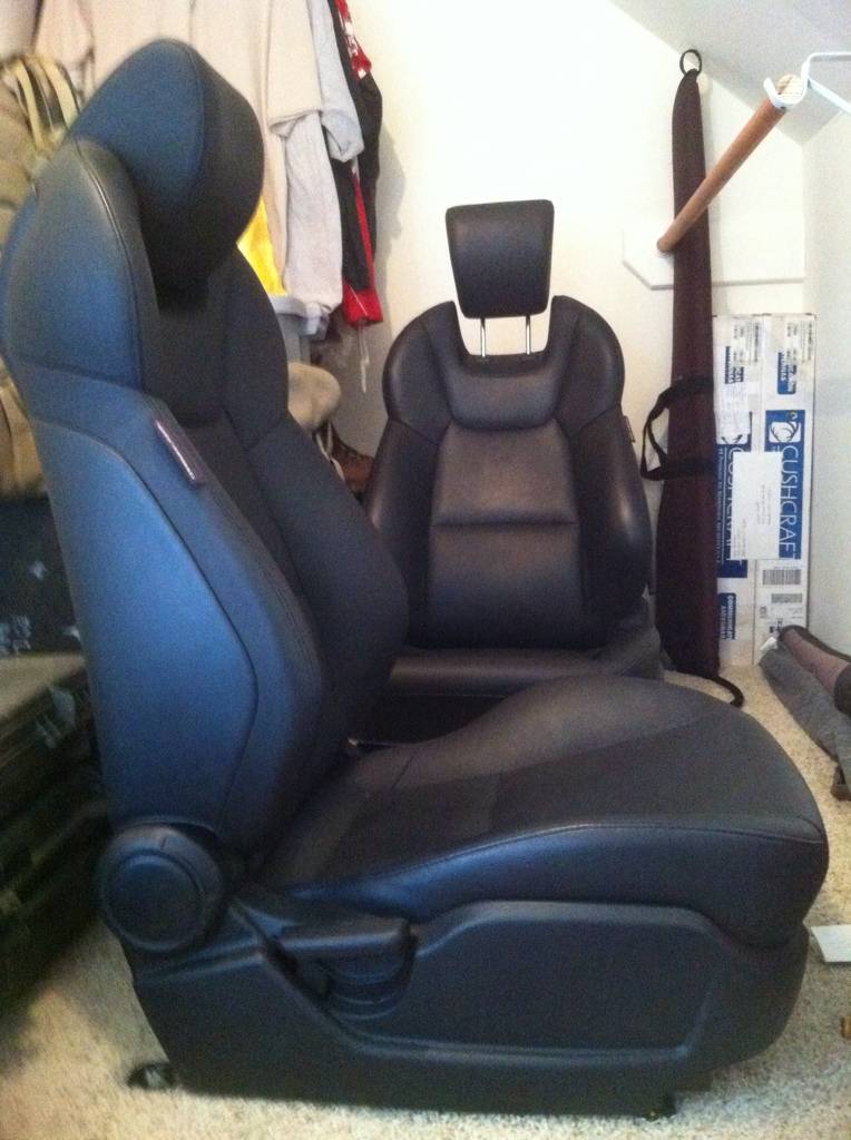 Factory black leather bolstered bucket seats out of a Gen Coupe Real