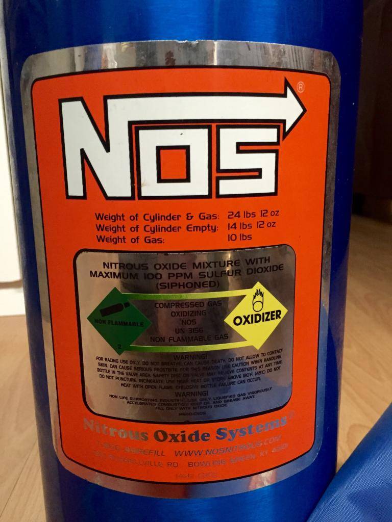 FS Nos Brand 10lbs bottle with a few accessories